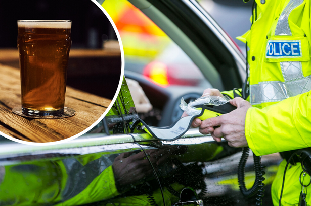 Police breathalyse a drink driver